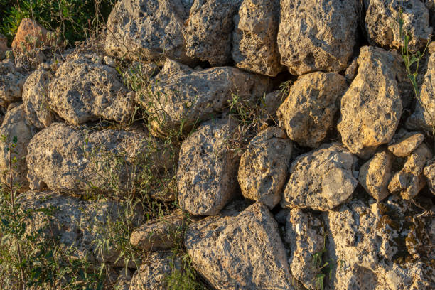Close-up of a dry stone wall, marge, in a rural field on the island of Mallorca, Spain