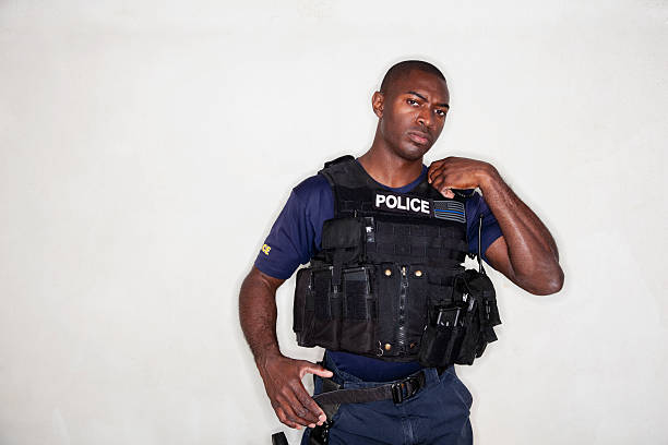 oficial de policía en traje táctico - sc0604 fotografías e imágenes de stock