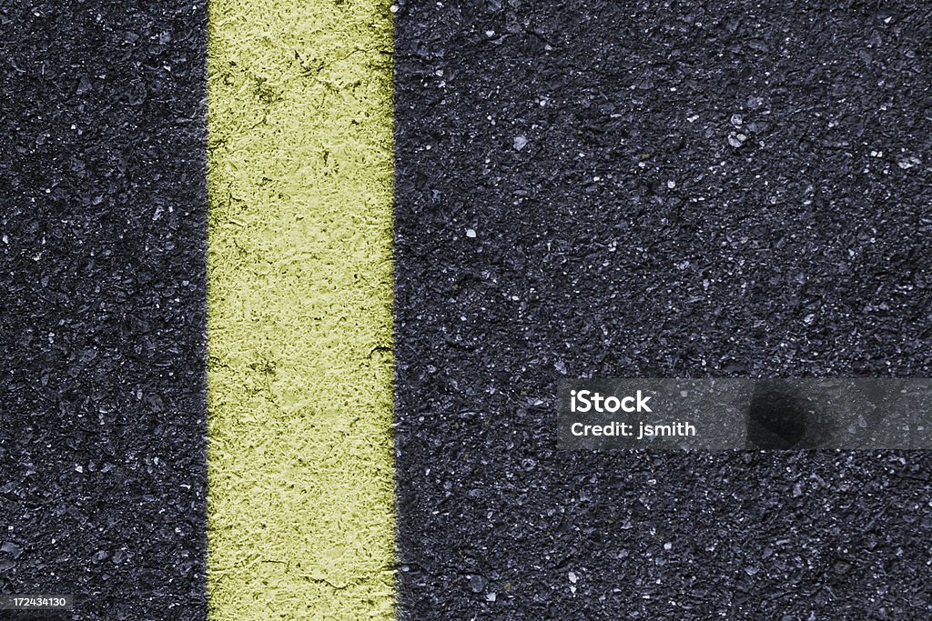 Yellow line background horizontal "close up of parking lot or road yellow line on pavement - nice balance for ad, brochure, postcard or catalog for a paving, heavy construction, trucking of painting company." Alaska - US State Stock Photo