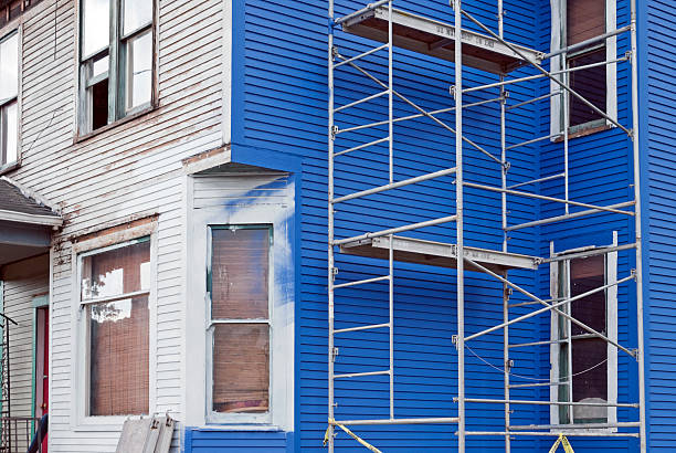 istock Early 20th century house being repainted 172434237