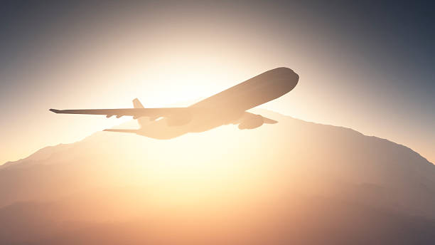 istock Aiplane flying over the hill at sunset 172434328