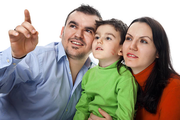 istock Young man showing something that the family 172434334