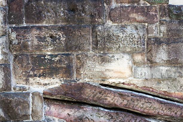istock Closeup old weathered sandstone wall with copy space 172435075