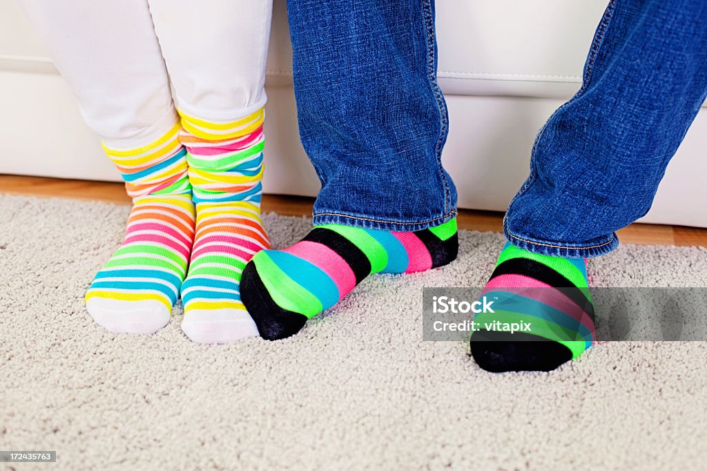 Tocando "footsies" - Foto de stock de Meia royalty-free