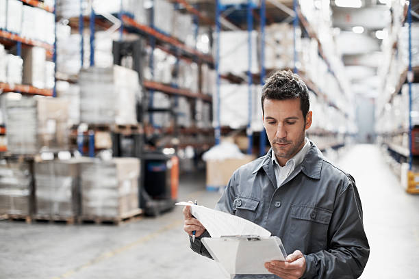 istock Man checking stock in a warehouse 172435786