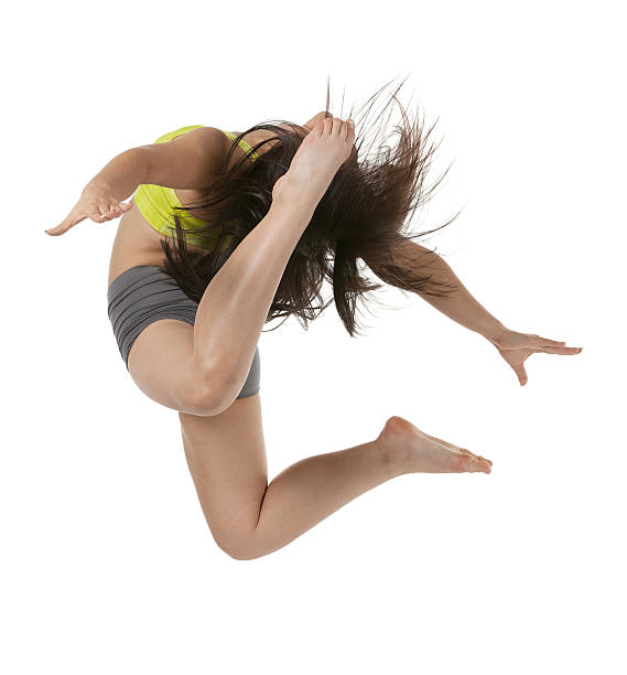 istock Woman jumping with arms outstretched 172436054