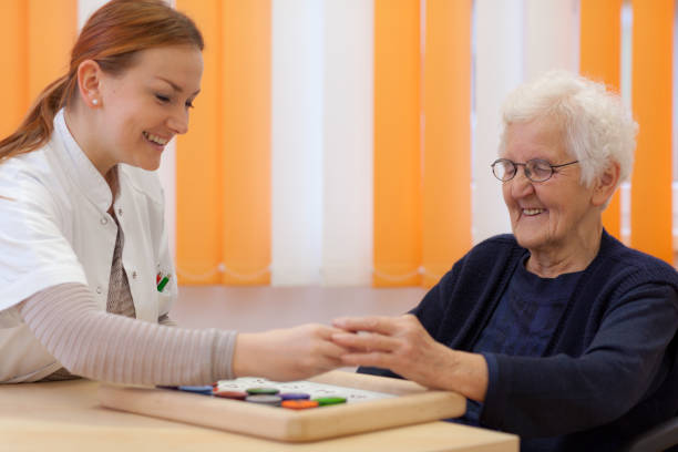 istock happy young and old woman playing game 172436083