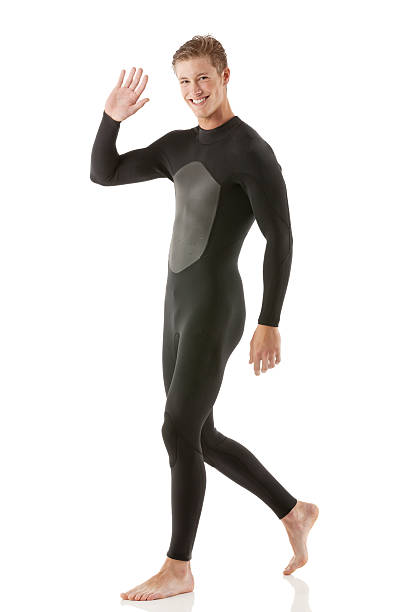 istock Man in wet suit waving hand 172436220