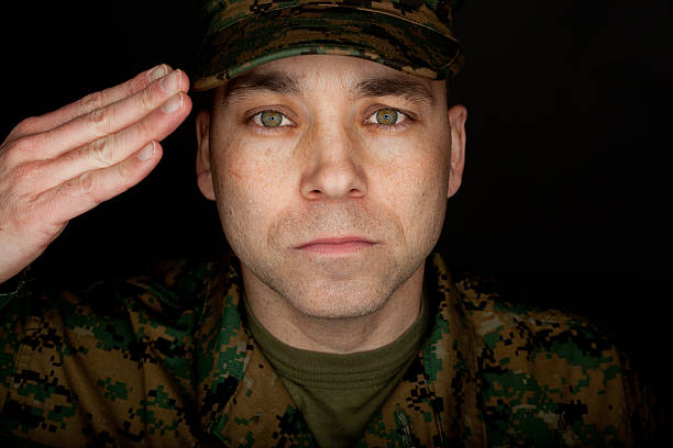 istock Saluting Marine Headshot 172436397