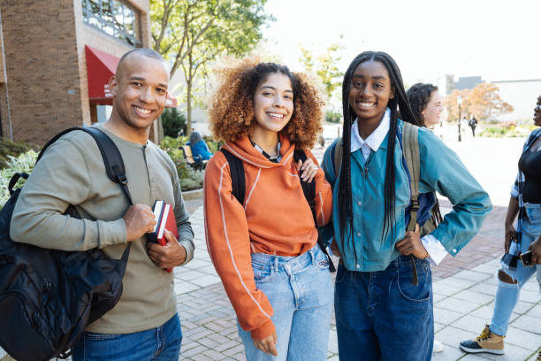 istock Group of diverse students in campus outdoors 1724366019