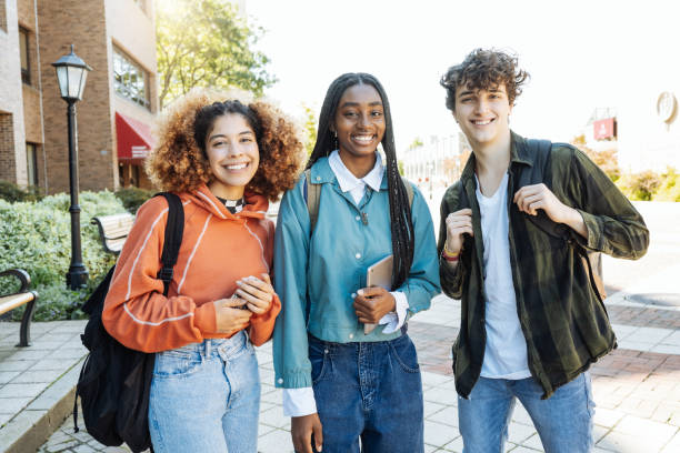 istock Group of diverse Latino and African students in campus outdoors on sunny springtime day 1724367114