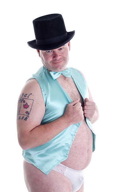 istock Man in top hat, vest and panties looking at camera. 172436833