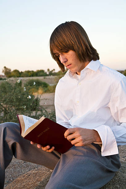 istock Teenager Reading the Bible. 172437025
