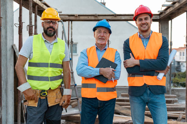 istock Male Caucasian architect, building contractor and engineer, on a construction site 1724370882