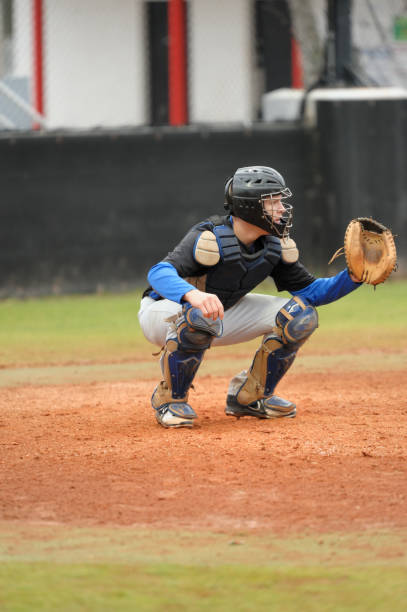 istock Baseball catcher about to catch ball 172437291