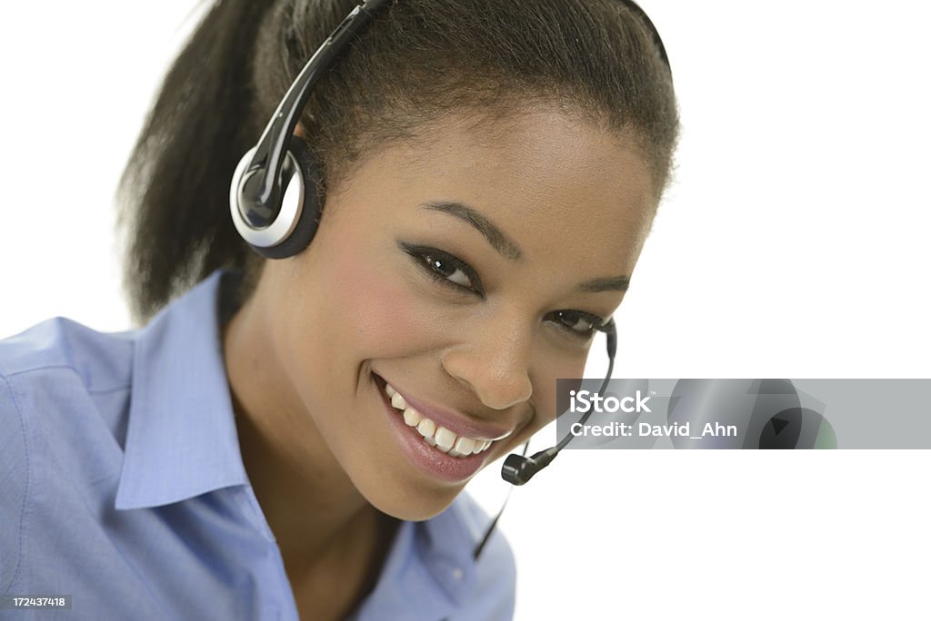 顧客サービスの女性の幸せなアフリカ - 1人のロイヤリティフリーストックフォト