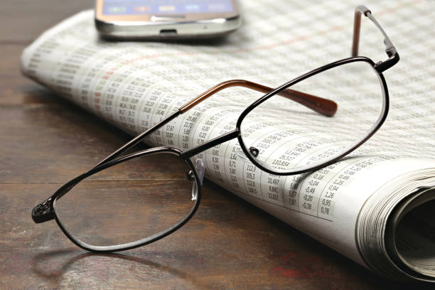 istock newspaper with stock quotations 1724378373