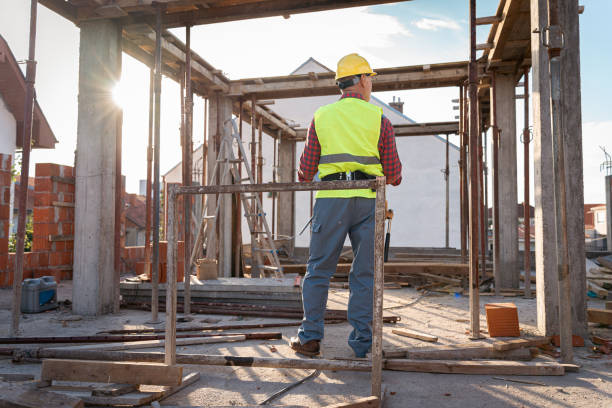 istock Unrecognizable senior Caucasian male building constructor doing the quality control on a construction site 1724382286