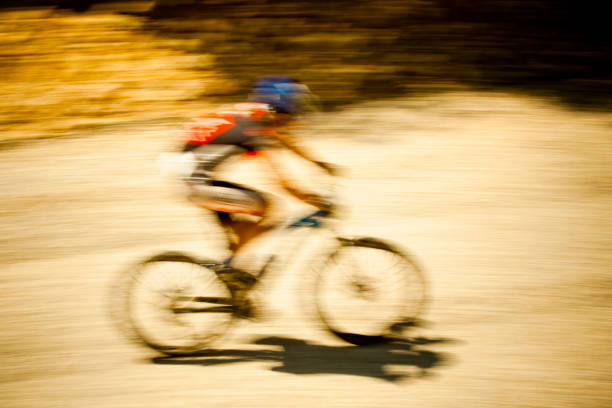 istock Fast MTB bicycle racer with motion blur 172438757