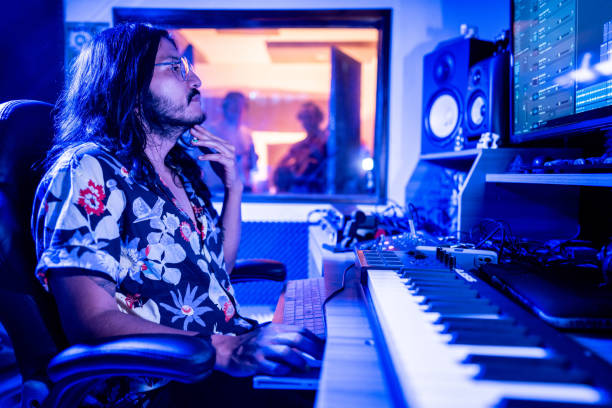 Producer making music or remix at music studio