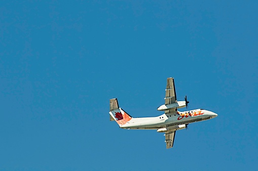 Image is intended for editorial use - Air Canada Jazz Turboprop Regional Commercial Passenger Aircraft After Take Off from Pearson Toronto