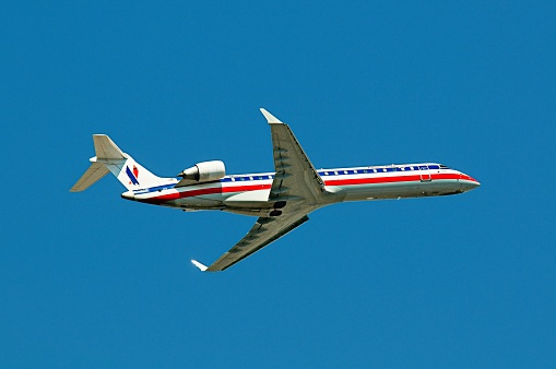 Image is intended for editorial use - American Airlines Regional Commercial Passenger Jet After Takeoff From Pearson Toronto