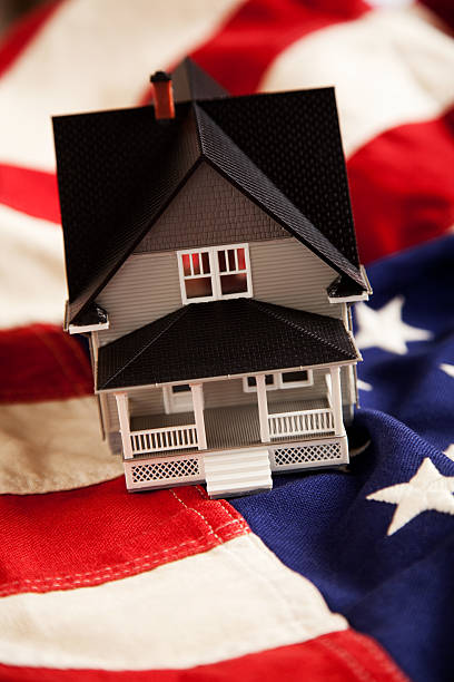 istock Small House on American Flag 172439344