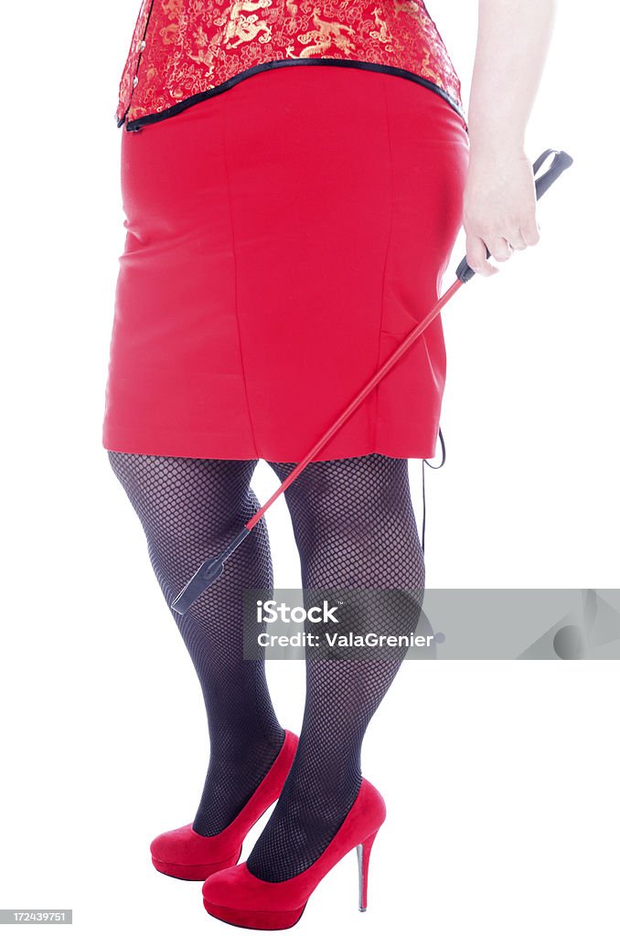 Cintura para baixo de mulher com vermelho Rebenque. - Royalty-free Domme Foto de stock