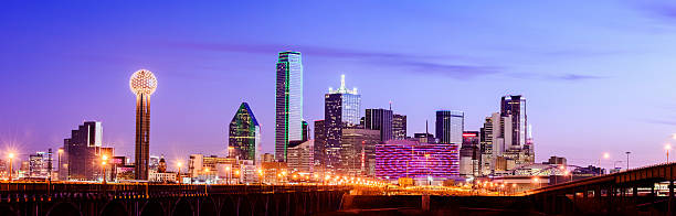 Panoramic View of the Dallas City Skyline at Night USA "Panoramic view of the Dallas skyline at twilight, USA" dallas texas photos stock pictures, royalty-free photos & images