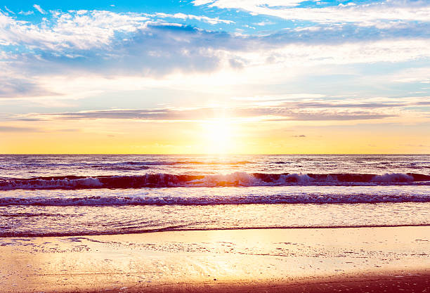 istock Early Morning Sunrise and Surf 172440007