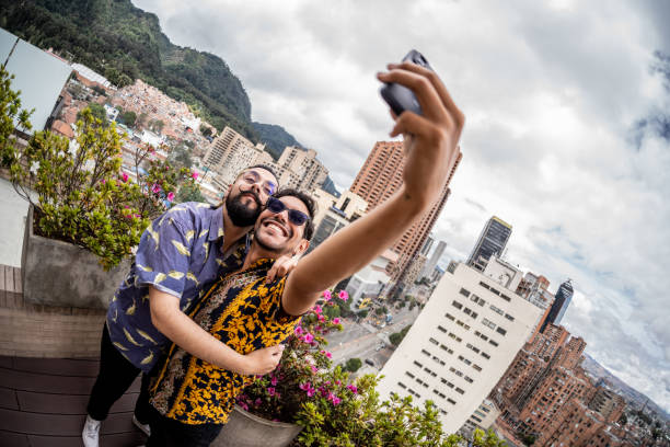istock Gay couple taking a selfie at balcony 1724401306