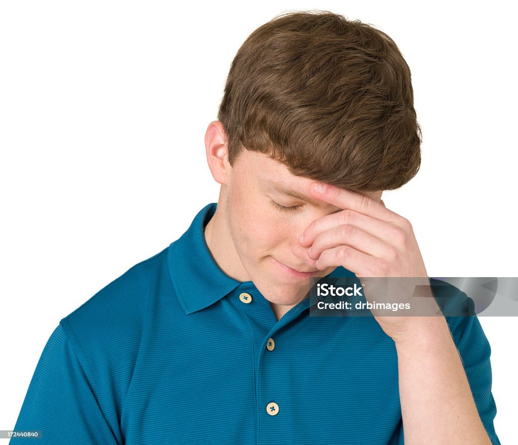 Sad Teenage Boy Portrait of a caucasian teenage boy on a white background. Teenage Boys Stock Photo