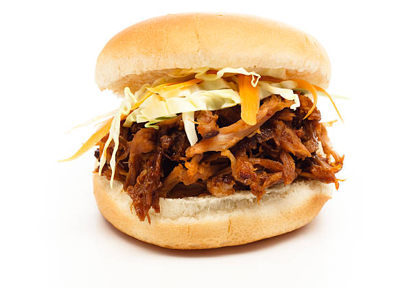 BBQ Sandwich and Slaw Studio isolated pulled pork sandwich with coleslaw barbecue pork stock pictures, royalty-free photos & images