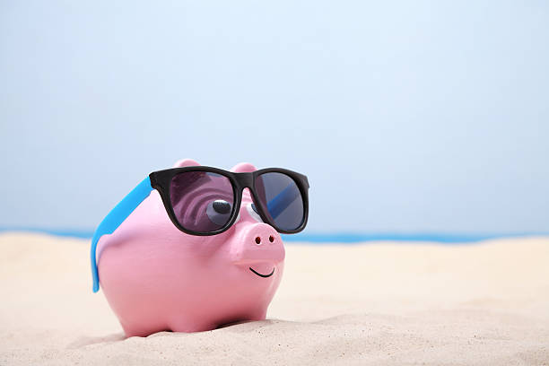 istock Piggybank at the beach 172441213