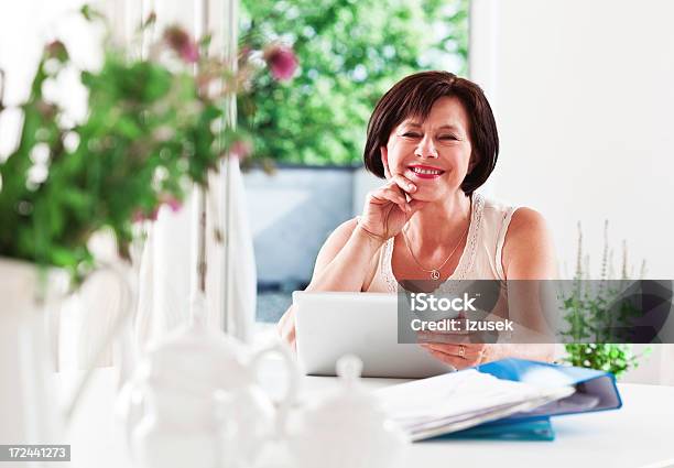 Senior Woman With Digital Tablet Stock Photo - Download Image Now - 60-64 Years, Active Seniors, Adult