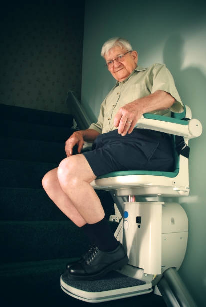 istock Senior Man Riding on Chair Lift 172441499