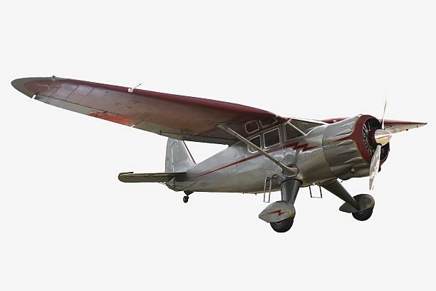 Bush Plane a restored 1943 bush plane on a white background bush plane stock pictures, royalty-free photos & images