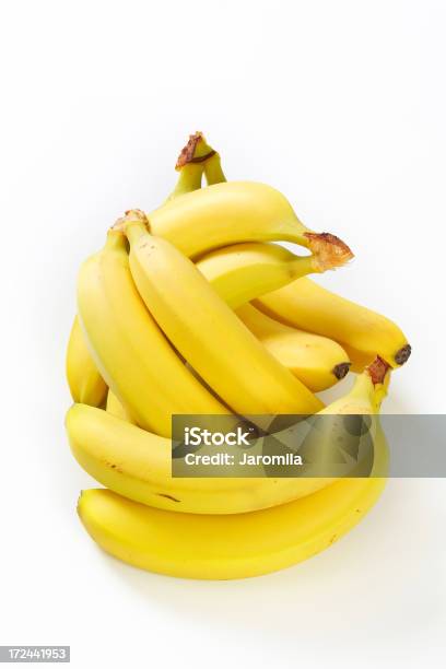 Foto de Bunches De Bananas e mais fotos de stock de Amarelo - Amarelo, Amontoamento, Banana