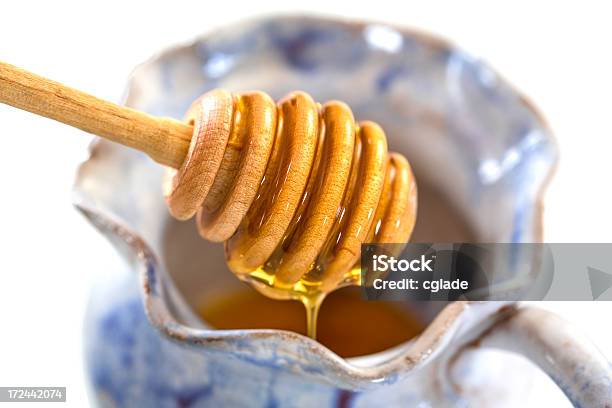 Sweet Golden Miel Foto de stock y más banco de imágenes de Alimento - Alimento, Amarillo - Color, Comidas y bebidas