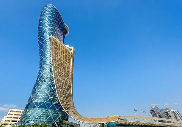 The landmark Capital Gate skyscraper (aka Leaning Tower) and the Abu Dhabi National Exhibition Centre.