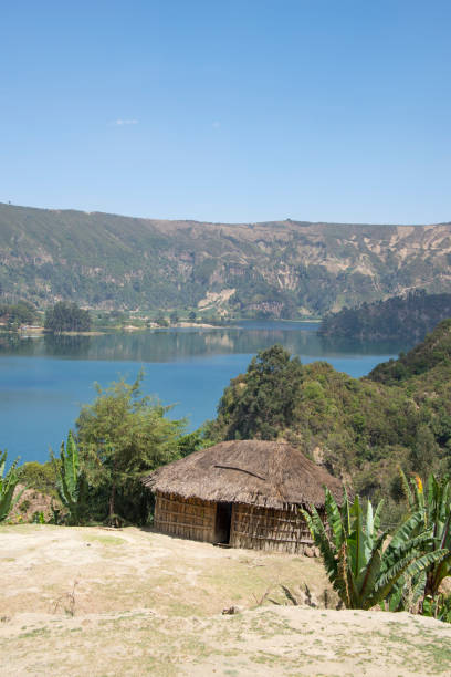 istock African hut on a lakesde 172442406
