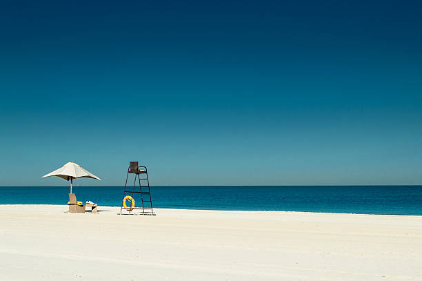 Lifeguard Patrolling The Sea Shore