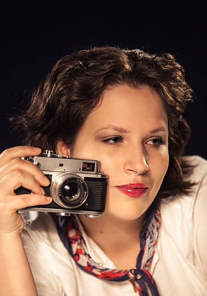 istock Girl with retro camera 172442901