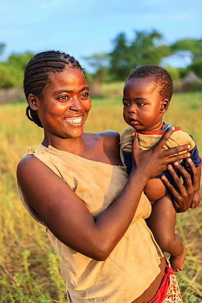 istock Woman from Samai tribe holding her baby, Ethiopia, Africa 172443473