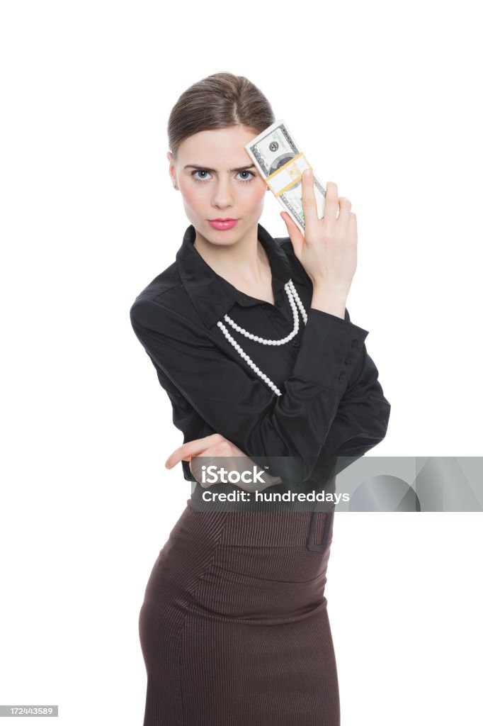 Businesswoman Holding conjunto de dólares - Foto de stock de Dinero libre de derechos