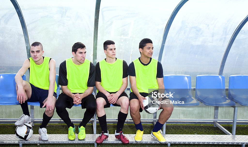 Reserve soccer players on the bench Reserve soccer players on the dugout. Soccer Stock Photo