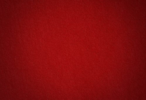 Red crumpled linen fabric texture background. Natural linen organic eco textiles canvas background