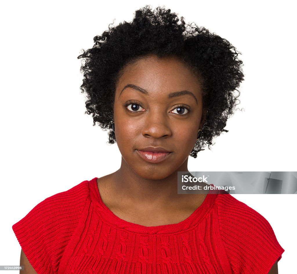 Serious Young Woman Looking At Camera Portrait of a young African-American woman on a white background. African Ethnicity Stock Photo