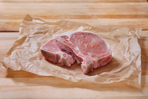 istock Raw Pork Loin Bone In Rib End Chop 1724445614