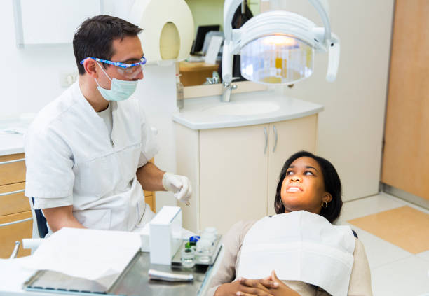 istock Cute black young women at the dentist 172445084